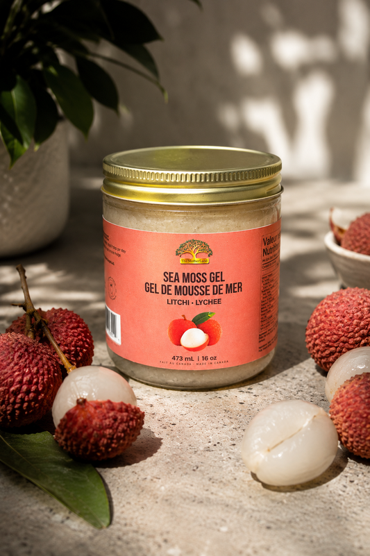 Jar of Sea Moss Gel with lychees on a textured surface
