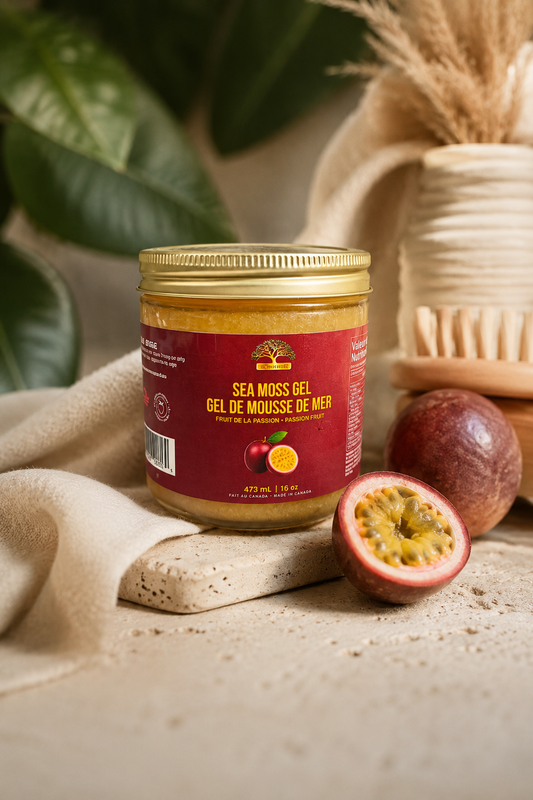 Jar of Sea Moss Gel with a red label on a textured surface with a passion fruit.